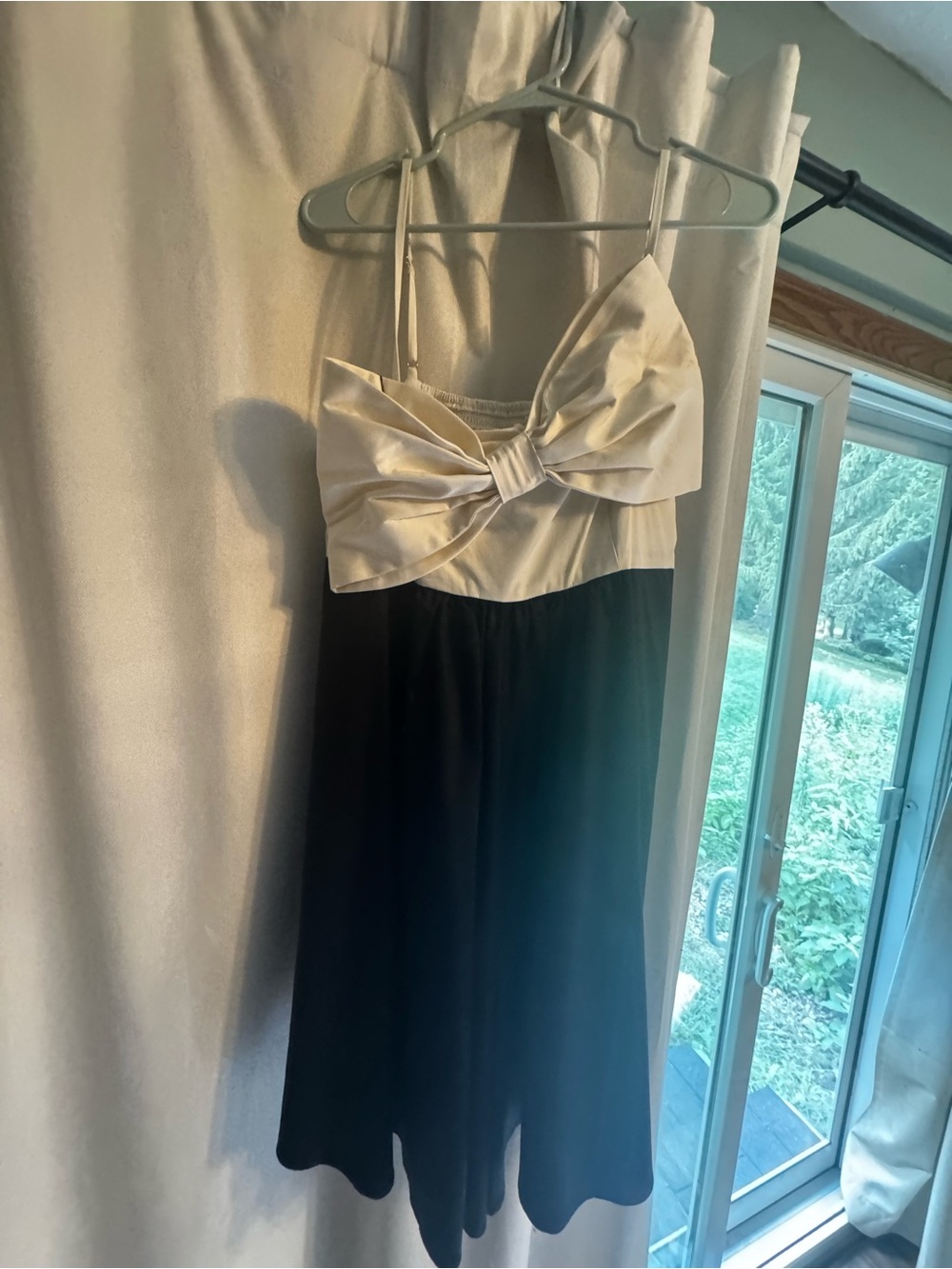 Anthropologie Two-Tone Black and Cream Bow-Front Jumpsuit